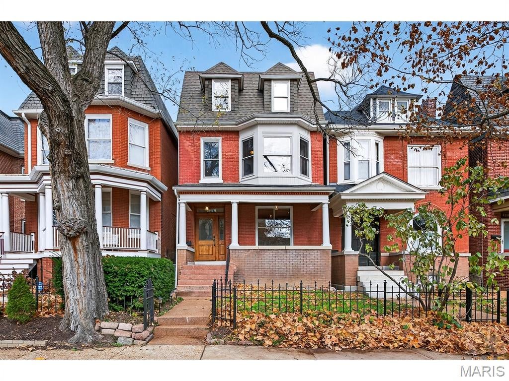 Talk about urban convenience! You can sip wine at a sidewalk table; see live music or a play, and do your grocery shopping all within 1 block of 4257 Maryland. Built in 1904 and completely renovated in 2008, this 5+B/3.5b home combines modern systems and finishes with the historic details that make each Central West End residence unique. From the ample front porch you enter an open Living Room/Dining Room space with 9'4" ceilings and a fireplace in each. The Kitchen, with granite tops and stainless steel appliances, spans the back of the house and features both an eat-in area and an inviting island. Through the rear door lies a substantial deck and cozy fenced yard. Through a gate is a 2-car parking pad accessed from the private alley. A Powder Room and Pantry complete the 1st Floor. The spectacular staircase leads to the 2nd and 3rd Floors. The front of the 2nd Floor is the Primary Suite, which boasts a huge bay window, abundant closet space and a bath with separate tub & shower. Two bedrooms, a bathroom and the Laundry complete the 2nd Floor. Two more bedrooms, a bathroom and an Office are found on the 3rd Floor. The bedrooms are graciously proportioned and light-filled, with 9'6" ceilings, large dormer windows and a skylight in the one at the rear. The basement is tidy and dry. Two HVAC systems with programmable thermostats--one for the 1st Floor, while the other serves the 2nd & 3rd.