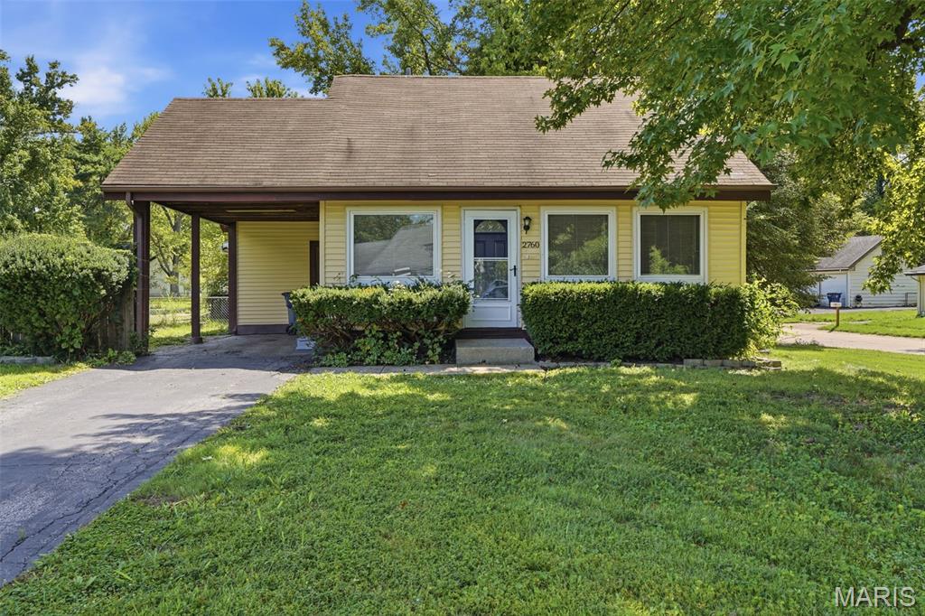 Don't miss this charming 1.5-story home featuring 2 bedrooms and a 1-car attached carport with a functional layout full of comfort and potential. The thoughtful floor plan offers inviting living spaces and the flexibility to fit a variety of lifestyles, while the upper level adds additional character and versatility. Whether you're looking for your next home or an investment opportunity, this property offers plenty of possibilities to make it your own. Schedule your showing today and see everything this home has to offer! One or more photos may have been virtually staged, AI generated, or digitally enhanced to illustrate the property's potential.