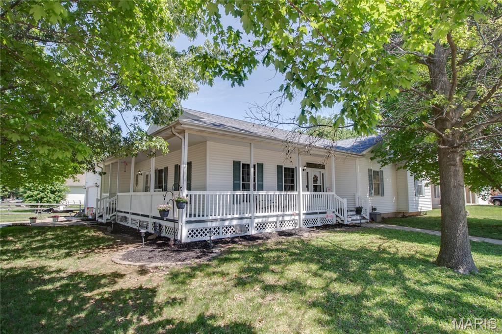 Welcome to 419 Geaschel Dr in Caseyville—a spacious, well-maintained home sitting proudly on a desirable corner lot in the sought-after Collinsville Community Unit School District 10. This property offers the perfect blend of comfort, updates, and room to enjoy both inside and out. You will find fresh paint throughout, along with new carpet and tile that give the home a clean, updated feel. The kitchen features solid wood cabinets and newer appliances. Double-pane windows that help with energy efficiency and showcase natural light. The primary suite is a true retreat, complete with a jacuzzi tub and separate shower. Downstairs, you’ll find a full, partially finished basement, providing flexible space for a second living area, home gym, or additional storage. 
Major updates bring peace of mind, including a new roof (2025), sump pump (2025), and water heater (2024).
Outside is where this home really shines—enjoy a massive pool just in time for summer, a covered wrap-around porch, and a screened-in sun porch that lets you enjoy the outdoors in comfort. The corner lot offers added space and curb appeal, making this home ideal for entertaining or simply spreading out.
If you're looking for a move-in ready home with big-ticket updates, great outdoor space, and a convenient location—call your favorite agent and book a showing!
