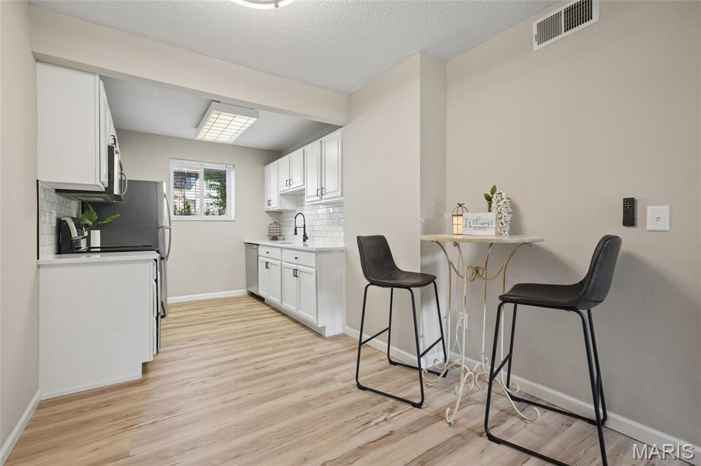 This rehabbed ground level 2-bedroom condo is styled with today’s most sought-after finishes, including stainless steel appliances, sleek quartz countertops, and the convenience of an in-unit washer and dryer. The bright, modern design makes this home truly move-in ready and full of possibilities. Make it your new home and enjoy the highly desirable Lake St. Louis lifestyle with access to lake amenities, swimming pools, tennis courts, clubhouse privileges, and more. Or take advantage of the strong rental demand for updated units and generate top-dollar rental income while retaining your rights to the Lake St. Louis amenities. All of this comes with unbeatable convenience, including quick highway access and close proximity to restaurants, shopping, and everyday essentials. A beautifully updated condo, flexible ownership opportunities, and the full Lake St. Louis experience all wrapped into one smart investment.