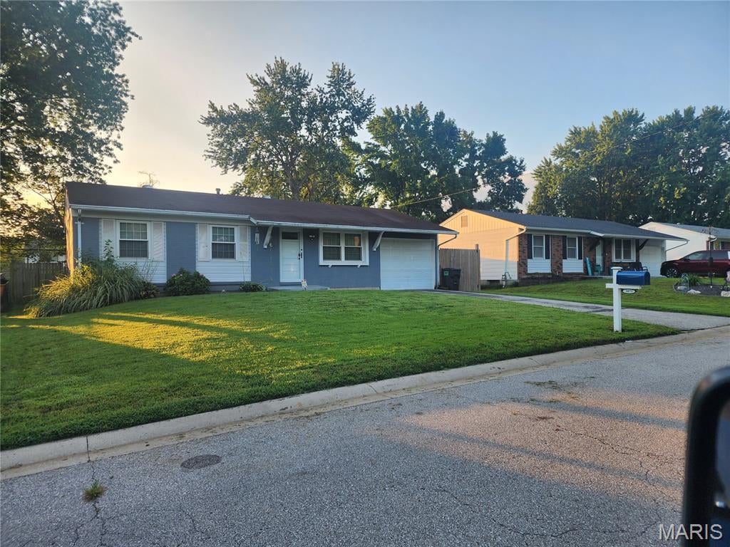 This 3 bed 1.5 bath home is in St. Charles Hills subdivision. Conv to HWY 70 and 370. This home offers New LVP flooring in the Livingroom, Hall and Kitchen. There is a finished office, half bath and drywalled REC room in the basement. Level yard with privacy fence and great neighborhood. This home is a short distance to St. Charles West High School, Jefferson Intermediate and Monroe Elementary.