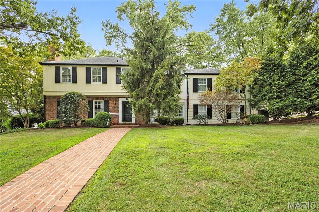 This spacious, traditional home in Ladue school district has been updated by the sellers with designer paint, carpet and appliances as well as re-zoned to include a New HVAC system for the upstairs that includes a new zone that covers the primary bedroom en suite separately from the other three bedrooms on the upper level. New fixtures in the bathrooms and much needed maintenance items were completed on the landscaping and exterior as well as minor repairs throughout the home to prepare it to be “move-in” ready. Personal opportunities for the current owners have them re-listing this dream home to become your “dream come true”. The in-ground pool and fully fenced back yard create an oasis to enjoy hot summers, cool evenings and outdoor dining. A finished breezeway with fireplace, formal living room with fireplace, formal dining room and sunny family room flow beautifully to allow congregation and separate entertaining spaces on the main level. A bonus living space in the finished basement rec room with fireplace allows for a more private getaway space to study, play or relax. These great updates can be yours now with a recent price reduction, giving you the jump start to add your personal touches.
