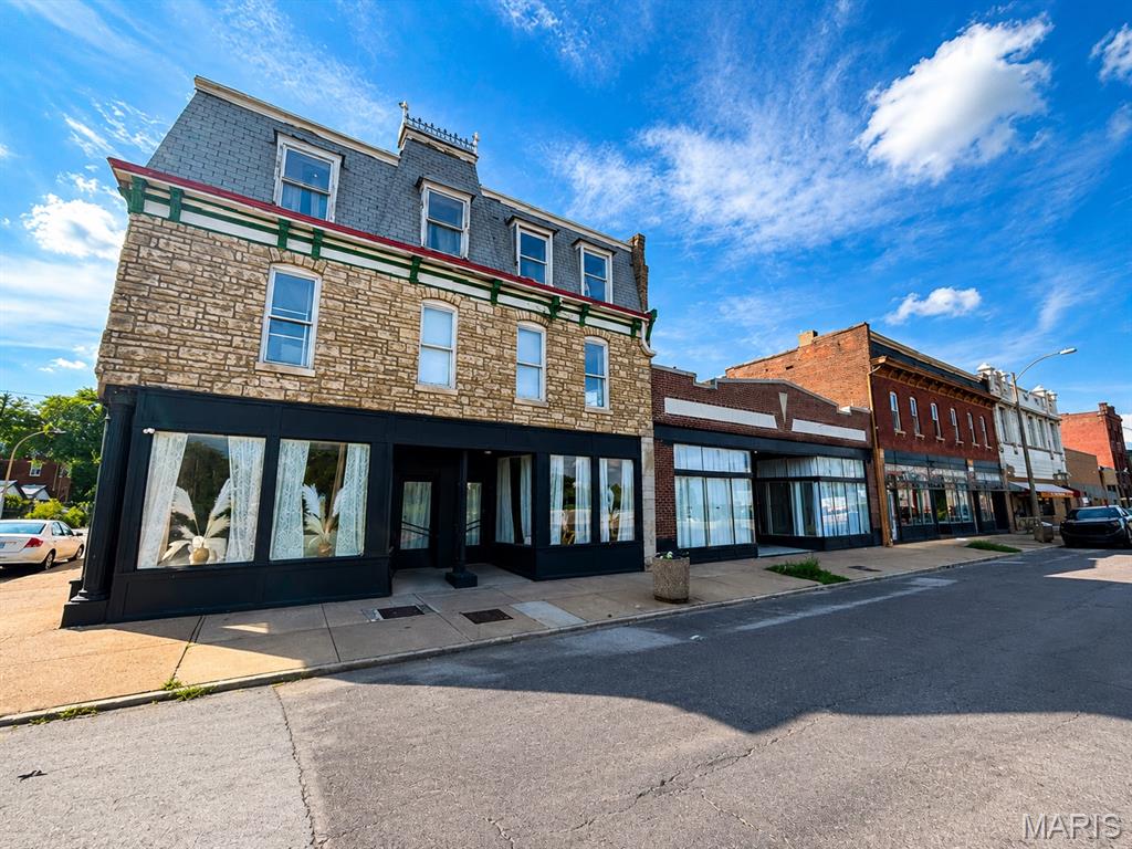 Listing includes 7317-29 S Broadway
Versatility meets opportunity in this mixed-use commercial and residential property, freshly listed along the ever-active South Broadway corridor.  This dual-purpose building invites investors and owner-operators to blend business ambitions with dependable rental returns—all at a price point engineered to make the numbers work. The property is already producing well over $7,000 in income between an event space and leased units, with more space to grow. Picture the flexibility: run a storefront or office on one side while collecting steady rent from the living quarters above or beside it. That live-work-lease dynamic is exactly what keeps this type of property in high demand across South City. With multiple income streams under a single roof, cash flow potential stays strong from the moment you take the keys. The generous configuration adapts to your vision, whether you're launching a new venture, expanding a portfolio, or securing a foothold in a neighborhood that continues to draw renters and entrepreneurs alike. Solid fundamentals and an accessible price make this a rare entry point into commercial ownership.

Smart investments like this move quickly. Reach out today and schedule your private showing.