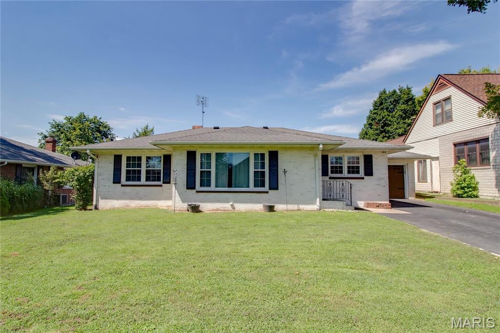 Check out this full brick ranch with tons of updates! 3 bedrooms, 2 baths, and an unfinished basement with tons of potential for future finished space. Enjoy the convenience of main floor laundry. Updated kitchen with new flooring, quartz countertops, and appliances to stay. Furnace and A/C replaced in 2020. Water heater - 2018 and windows were replaced 10 years ago. Electrical panel has been updated and wired for a generator. There is fiber-optic internet available. Attached, oversized, 1-car garage with front and rear overhead doors along with a carport for additional covered parking with secondary access from rear alley. Fenced backyard, screened-in back porch, and storage shed with concrete floor and electric. Roof is approximately 10 years old. Flooring in bedroom was replaced 2 years ago.