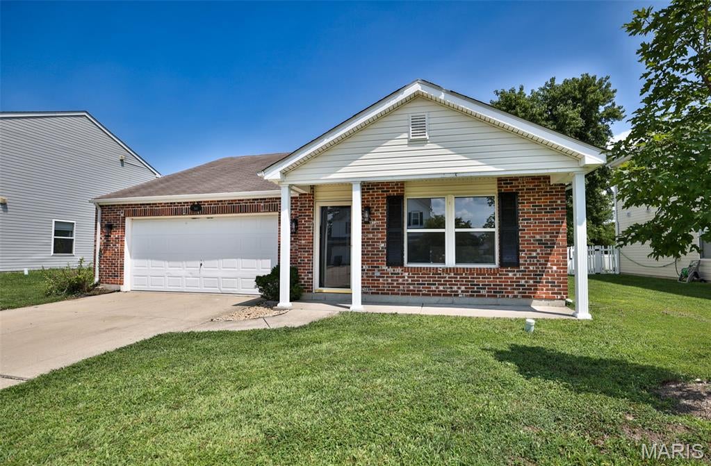 Enjoy the ease of single-story living in this beautifully updated home. The bright open floor plan connects the living space to a modern kitchen, which features a new central island, new countertops, and stainless steel appliances. Freshly painted walls and new luxury vinyl plank flooring run throughout, creating a clean canvas that is ready for your personal touch. Right outside the kitchen, a large flat backyard offers the perfect spot for outdoor dining, gardening, or relaxing. Complete with a two-car garage for extra storage, this move-in-ready property is perfect for everyday living and easy entertaining. Contact your realtor today to see it in person!  New lighting, updated bathroom, and a new roof (the roof will be installed as soon as the roofing company can schedule it).