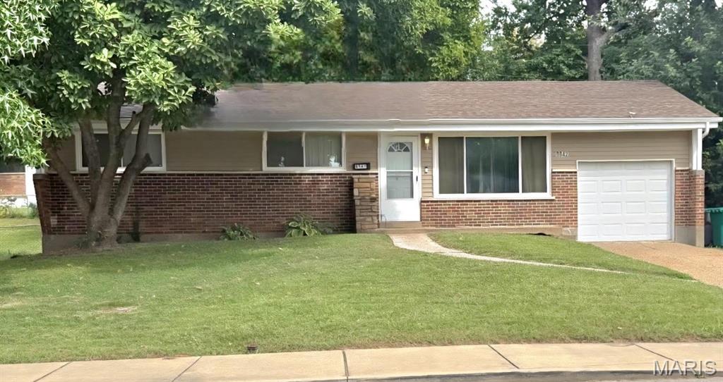 Charming, Comfortable, and Cozy! This well-maintained home features 3 bedrooms, 2 full bathrooms, and a garage. Vaulted ceilings in the living room create an open and inviting main-level space for relaxing and unwinding. The updated kitchen is equipped with stainless-steel appliances, including a microwave, range, and refrigerator, which will remain for the next owner’s convenience. The lower level offers a fully renovated bathroom, recessed lighting, flexible space for recreation or entertaining, and additional storage. Prior to closing, the seller will also repaint the basement's bathroom's floor and its common area's floor and walls. Major improvements include new windows, an air conditioning unit, and a roof all installed in 2019; a water heater installed in 2024; and professionally cleaned air ducts in 2026. With its updates, practical features, and functional layout, this ranch is ready for its next chapter. Welcome home!