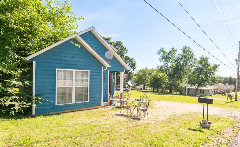 Adorable 1-bedroom, 1-bath home full of charm and character!  The beamed vaulted ceiling creates an open and inviting living space.  Plenty of outdoor space with room for gardening, recreation, or build another home on the other lot!  Ideal for empty nesters, first time home buyers, a weekend retreat, or investment property.