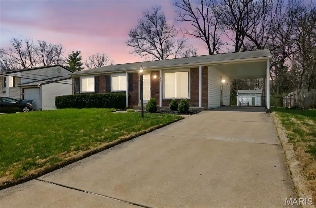 Welcome to your dream home in the heart of Maryland Heights! This charming ranch offers the perfect blend of comfort, charm, and convenience. Offering 3 bedrooms, 1.5 bathrooms, and 1,044 square feet of living
space. This home is just moments away from beautiful parks and highly rated schools. Open family room, complete with a large picture window and natural hardwood floors throughout. Large eat-in kitchen offers ample
counter space for meal prep and entertaining. The primary bedroom features two closets
and an attached half bath. Two additional bedrooms and a full bath are located in the hallway, providing plenty
of space. Step outside to a large covered patio and fenced-in backyard backing to trees, offering privacy. The unfinished basement is a blank canvas waiting for your personal touch. Transform it into a recreation room, home gym, or additional living space the possibilities are endless. New windows and a patio door installed in 2024, ensuring energy efficiency! Don't miss the opportunity to make this adorable ranch your forever home. Schedule your showing today and discover the charm and convenience!
