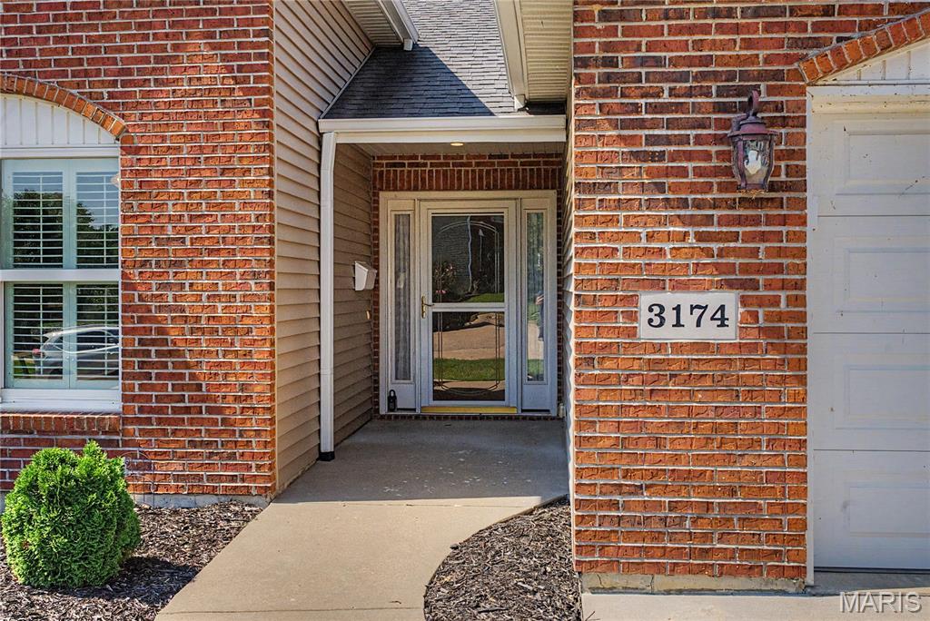 Comfortable, convenient, clean - this move-in ready, open concept home is close to everything. Shopping, travel, medical facilities and entertainment are all moments away. At approximately 1400 square feet of one-level living, there's ample space with little fuss. Vaulted ceilings and natural light invite you in. Then, enjoy gathering around the kitchen island with granite countertops, relaxing in front of the gas fireplace with a book or tv show.  The home sits on a low-traffic street, and the two-car attached garage features extra room for storage. Come see how easy the living can be.