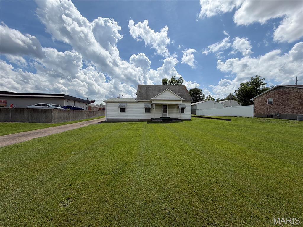 Commercial opportunity near the Highway 51/61 junction! This 1.056 acre property is zoned C-2, offering flexibility for a variety of potential uses. Continue utilizing it as a residential property with some updates and improvements, or explore the possibilities for your next business venture. 1346 sq ft home with 32 x 36 detached garage. High-visibility location with excellent accessibility and potential in a growing commercial corridor.