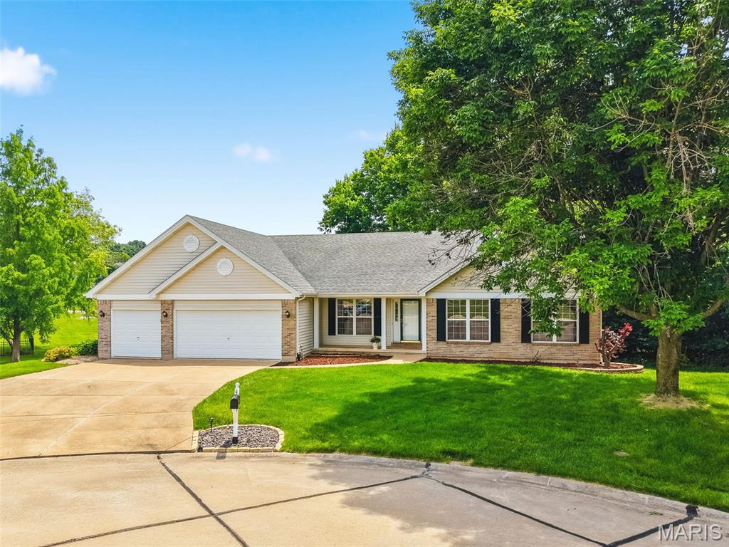 UPDATE: 9pm offer deadline - offers due by 9pm, May 30th.  Showings start Thursday, May 28 at 4pm. Welcome to another beautiful ranch home in the highly sought after Avondale Heights Subdivision. This home is nestled in a cul-de-sac backing to trees and one of the subdivision ponds for ultimate privacy. All main floors have been upgraded to luxury vinyl plank. Enjoy an open concept with the dining room, great room and breakfast room/kitchen. A whole house painting was just finished! The kitchen is large with a center island and seating, a full pantry, and breakfast room as it flows the the 4 seasons sun room and exterior composite deck overlooking the patio and back yard. The great room boasts a gas fireplace and plenty of room for lounging. A separate dining room sits at the front of the home as well. The primary suite has a large walk-in closet, a soaking tub, separate showing, dual vanities and plenty of natural lighting. 2 other bedrooms accompany the main floor with their own walk-in closets! The basement is unfinished with a walkout sliding door, another separate exterior door, egress windows for more bedrooms, a bathroom rough-in, slop sink, and sump pump/pit. The home is fully landscaped and ready for more personal touches from the next owner. Could be you! Conveniently located close to everything, but far enough to not hear the noise!
