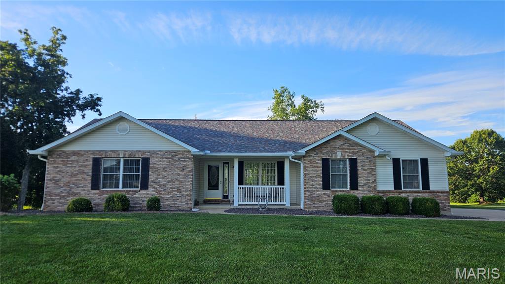 Rarely does a property this clean and meticulously maintained come to market. Nestled on 3.8+/- acres with scenic views and beautiful, mature trees, this nearly 1,500 sq. ft. ranch offers the privacy and freedom you've been searching for outside of a subdivision.

The home features 2 bedrooms, 2.5 baths, custom cabinetry, Anderson windows, fresh paint throughout, and a warm gas fireplace that anchors the living space. Quality construction is evident throughout, including blown-in insulation in both the walls and attic, solid wood interior doors throughout, a finished garage, and a new roof installed in 2023. Gateway Fiber internet is available for those needing reliable high-speed service.

The full walk-out basement is in excellent condition, and already roughed in, making it ready for your finishing touches and future expansion. Outside, enjoy the covered back porch, asphalt driveway, and beautiful surroundings that create a truly scenic setting.

Properties this clean and well cared for are hard to find. If you've been searching for acreage, quality, and privacy, this one will not disappoint!