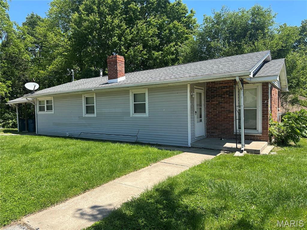 Great property for a rehab or a buy and hold! Rent estimate fixed up $12500-1350 per month depending on condition. Don't miss this! So much opportuntiy here. Property is located right next to the middle school. Features large rooms, large kitchen, walk out basement and so much more! Make your appointment today! Seller is selling in "as is" condition and will not make any repairs/will not pay for occupancy inspection or provide a permit.