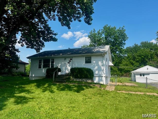 This absolutely fantastic single-family ranch home is the perfect addition to your rental portfolio. Don't miss this already occupied ranch home that offers a large living/dining room combo with beautiful hardwood floors, currently rented for $1050 per month! The large kitchen is bright with plenty of cabinet space. Down the hall you'll find 2 nice sized bedrooms and a full bath all on the main level.The property sits on just over .25 acres and has an over-sized detached garage and partial fencing. Updates include fresh paint, new tub enclosure, vanity, garage door, all water pipes, cast iron replaced with PVC and 2024 water heater. Please do not disturb tenants.