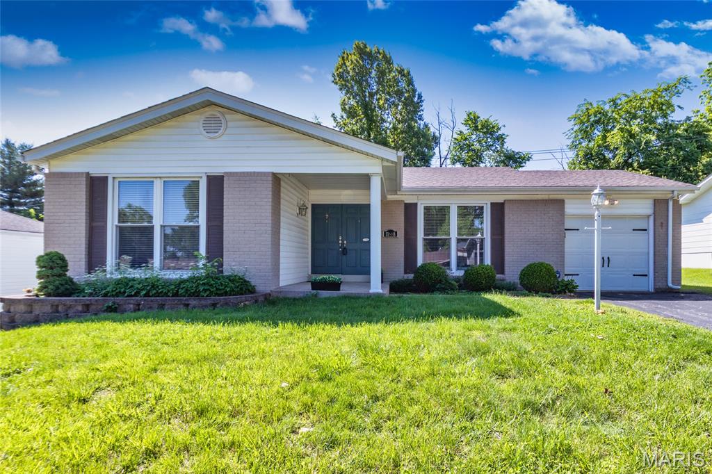 Welcome home to this beautifully maintained ranch located in the highly sought-after Parkway School District! A charming covered front porch invites you inside. Fall in love with the open living and dining rooms featuring beautiful hardwood flooring and abundant natural light. The kitchen opens seamlessly to the family room, creating a great space for everyday living and entertaining. Family room offers wood flooring and easy access to the patio, while the kitchen boasts tile flooring, pantry, dark wood cabinetry, granite countertops, and stainless appliances. Spacious primary suite features wood flooring and a private ensuite bath with tile flooring, vanity, and shower. Two additional bedrooms with wood floors and a clean hall bath complete the main level. The finished lower level offers a spacious recreation room with carpeting, plus plenty of storage space and a convenient laundry area. Relax on the patio outside overlooking the lush backyard. Additional highlights include an oversized 1-car garage and newer furnace (less than 1 year old). Showings begin 5/20/2026!