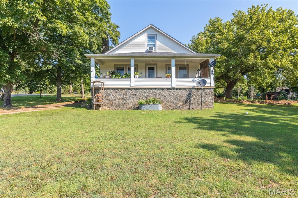 Spacious 7 bed, 3 bath home nestled on approximately 14.35 +/- acres in beautiful Piedmont, MO! This property offers the perfect blend of comfort, space, and rural charm. The land is partially fenced and features serene creek access, making it ideal for livestock, recreation, or simply enjoying nature. A well-equipped barn with stalls, water, and electric adds to the property’s versatility. Inside, the home provides ample living space with potential for even more—thanks to a large unfinished basement where additional bedrooms have already been added. Relax on the covered front or back porches and take in the peaceful surroundings. Room to grow, inside and out—don’t miss this opportunity!