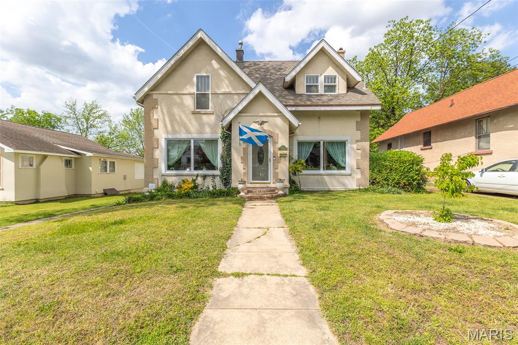 Charming 4BR/2.5BA historic home in the heart of Poplar Bluff! This well-maintained property offers timeless character with modern updates throughout. Features include original hardwood floors, a spacious living areas, a gas fireplace in the living room and a wood-burning fireplace in the family room, plus an updated kitchen with stainless steel appliances and ample cabinetry. Bathrooms have been refreshed, including a beautifully tiled walk-in shower. Enjoy the large backyard with a covered patio—perfect for relaxing or entertaining. Conveniently located near downtown amenities while nestled in an established neighborhood. A perfect blend of historic charm and modern comfort—don’t miss this one!