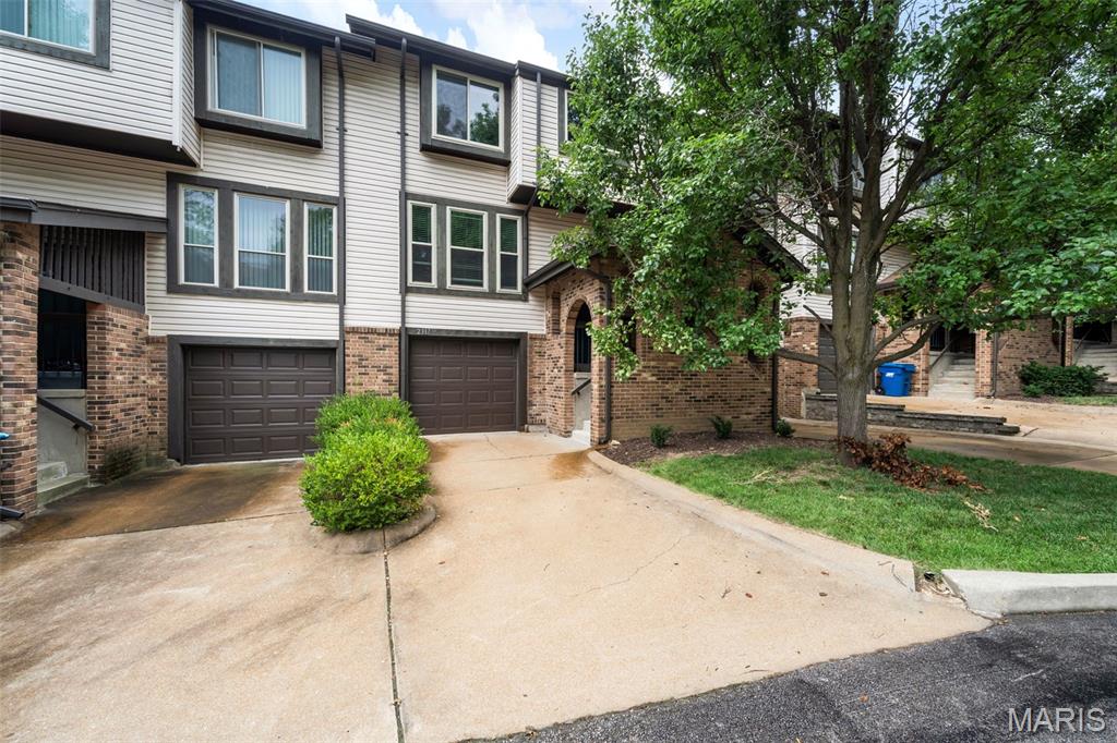 Welcome to 2317 Driftwood Place, a beautifully updated condo offering comfort, convenience, and move-in-ready living in the heart of Maryland Heights. Step inside to find stylish new vinyl flooring throughout, a spacious kitchen featuring granite countertops, stainless steel appliances, and plenty of cabinet and counter space. The kitchen opens to a large deck, perfect for relaxing or entertaining. The bright living room offers abundant natural light, while the upper level features a spacious primary suite, two additional bedrooms, full bath, and convenient 2nd-floor laundry. The finished lower level provides additional living space with a decorative fireplace and walkout access to the fenced backyard. In addition property has all new windows helping with efficiency and utilities! Ideally located near shopping, dining, Creve Coeur Park, and major highways including 141 and 364. Don't miss the opportunity to make this exceptional condo your new home!