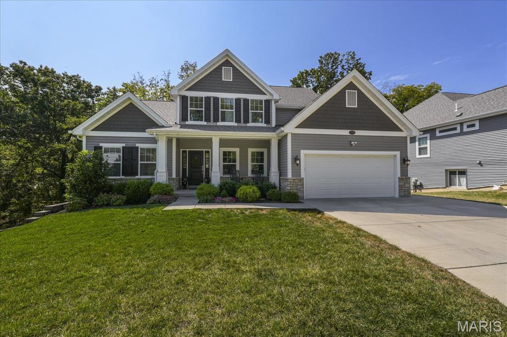 Welcome to 656 Clear Brook Dr., a beautiful newer construction home in sought-after Des Peres and award winning Kirkwood School District! Featuring 5 bedrooms, 4 full baths and one half, this spacious home boasts nearly 3600 sq.ft. of living space! The great room is stunning and showcases a focal point fireplace, built-in cabinets and large windows. The bright kitchen and hearth room are sure to be favorite spaces for gathering! The kitchen boasts white cabinetry, stainless appliances, quartz countertops with large peninsula, pantry, and under cabinet lighting. The main level also features a charming dining room with custom moldings and a sought-after main floor primary suite with tray ceiling, luxurious bath and walk-in closet. Main floor laundry with storage cubbies and half bath complete this floor. The second floor features three additional bedrooms and two full baths. The walkout lower level is an entertaining dream! Spacious rec/fam room with beautiful custom bar, walls of windows, a 5th bedroom/office with built-in Murphy bed and full bath. So much to love! Step outside the lower level to the patio, hot tub and private backyard complete with wooded firepit area. Located on over a half acre lot, the wooded view is spectacular! There’s also a private deck just off of the kitchen/hearth room. So many spaces to enjoy outdoor living- a home to enjoy inside and out!