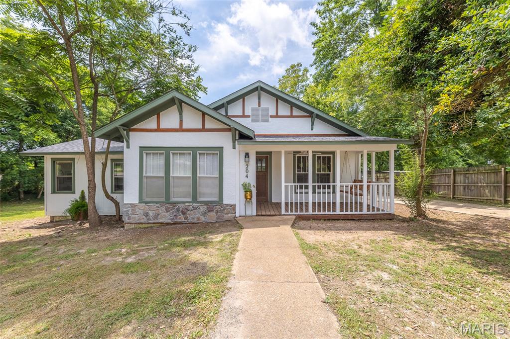 Super sharp, totally remodeled 4 bedroom, 4 bath home with lots of character. Don't miss the library! Or the hardwood floors, new deck, new roof, and so much more. Check out the electric fireplace with mantle.  Stainless and black appliances in the kitchen, sharp lighting fixtures throughout the home. Double size city lot of approximately 1/2 acre includes a detached 2 car garage/shop and an older one car garage.  The lot goes the full depth of the city block so you can access it from Brooks Street or Spring Street. This is an agent owned investment property that we have poured the last several months into, making it one of our favorites that we have ever done.