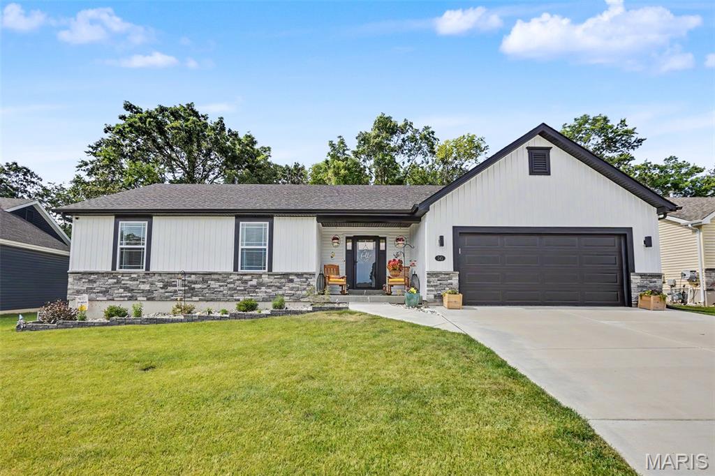 Discover modern living at 343 Birchwood DR, Moscow Mills MO 63362, a newly constructed single-family residence from 2023. This attractive property offers a fresh start in a great condition, designed for comfort and contemporary style. The heart of this home, the kitchen, is equipped with sleek stainless steel appliances, ready for culinary exploration. Adjoining this space, a bathroom features a double vanity and a walk-in shower, providing a spa-like experience within your own home. With three well-appointed bedrooms and two bathrooms, this ranch-style home provides ample space. The attached garage offers convenience, while the outdoor living space, complete with a patio and porch, extends your living area into the open air. This is an opportunity to embrace a lifestyle of ease and sophistication; schedule your private viewing today.