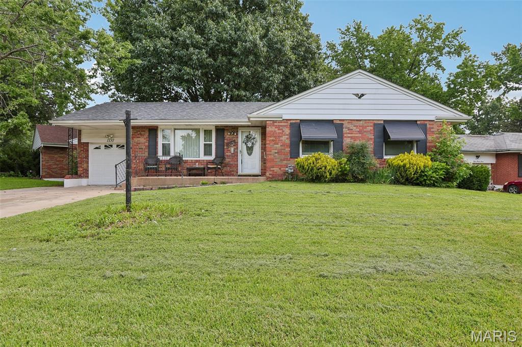 Welcome to this well-maintained all-brick ranch situated on a desirable corner lot in a quiet, established neighborhood! Enjoy peace of mind with a brand-new roof, plenty of off-street parking, and an attached 1-car garage. The fully fenced backyard offers mature shade trees and a spacious patio—perfect for relaxing, entertaining, or pets. Clean, solid, and move-in ready with endless potential. Conveniently located near shopping, schools, parks, and major highways. Don't miss this great opportunity—schedule your showing today!