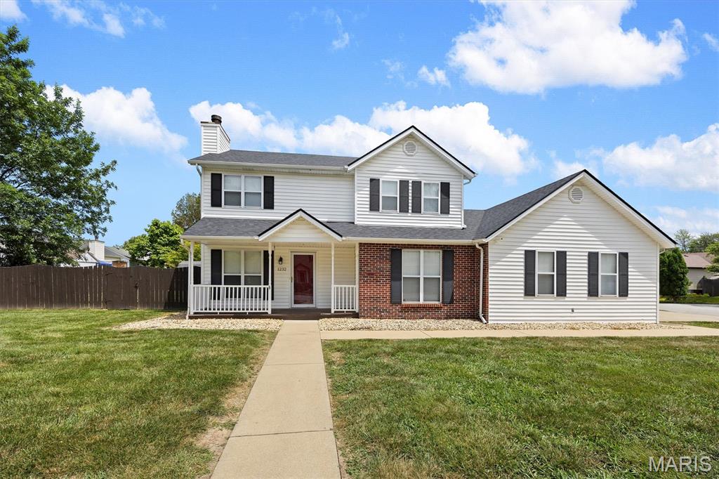 Amazing find in O'Fallon! This well-maintained 4-bedroom, 2.5-bath home offers a spacious & functional layout with room for everyone and plenty of flexibility. The main floor is home to a generous living room and dining room combination featuring engineered wood flooring and a fireplace, creating a warm and inviting space for relaxing or entertaining. The eat-in kitchen offers laminate flooring, plenty of cabinet space, a breakfast nook and all appliances, including the refrigerator, gas range, over-the-range microwave and dishwasher.
Also on the main level is a spacious primary suite with a private attached bath, along with a convenient powder room and laundry area with hookups for either a gas or electric dryer. Upstairs, you'll find three generously sized guest bedrooms, a full guest bath and a versatile loft space that offers endless possibilities for a home office, playroom, hobby area, reading space or additional living area.
Enter outside to enjoy the covered front porch, perfect for your morning coffee, and the rear deck overlooking the fenced backyard. The large corner lot provides plenty of outdoor space, while the side-load 2-car garage adds convenience and great curb appeal. Ideally located near Scott Air Force Base, hospitals, shopping, dining and more. A rare opportunity to find this much space, versatility, and functionality in such a convenient O'Fallon location!