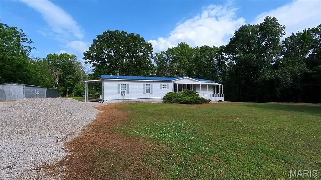 5 acres of level land with a well cared for 1993 mfg. home. Owner in the process of packing and can close quickly. Has 3BD/2BA with 2 Fireplaces - one in the living room and one in the dining room. Primary bedroom and bath are on the separate side of the house from the other bedrooms. 2 garage enough room for 4 vehicles or storage. Storage shed 15'7 x 11'11. Firepit. Well pump replaced 2010 goes to 425'. Has Howell Oregon utilities
