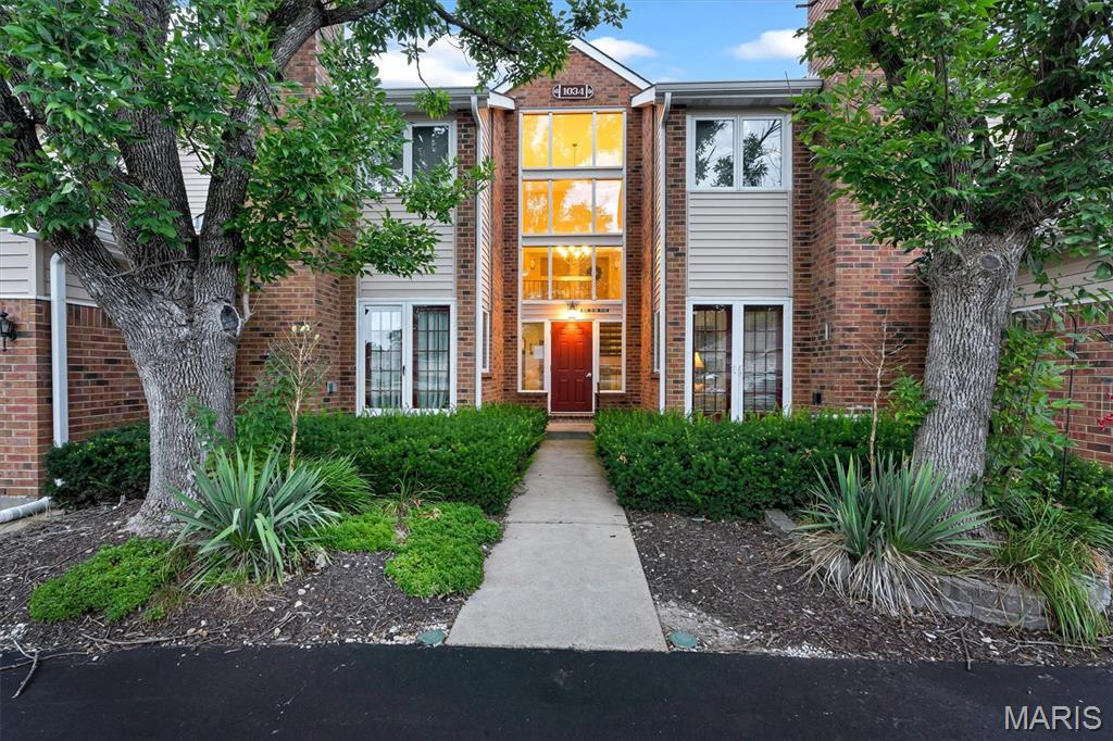 Located in a prime location, this lovely 2 bed, 2 full bath condo has been tastefully decorated, is as clean as a whistle, and is ready for a new buyer to call home. Enter into an pleasant ambience with cozy living room featuring luxury vinyl plank flooring, white-washed wood burning fireplace, & ceiling fan. Kitchen brandishes black granite countertops, trendy white cabinets, gas stove range, stainless steel fridge & dishwasher, & eat-in breakfast area. Nice back deck overlooking pond & woods. Storage area off the deck. Hallway laundry with gas dryer hookup. Fridge & washer & dryer stay. Primary suite with large walk-in closet with shelving, shower/tub combo, & tranquil seafoam paint. Good sized 2nd bedroom & bath. This attractive property is more than just a place to live; it's a launchpad for fun and relaxation. Amenities include tennis courts, clubhouse, & pool. Nature trails connecting to Ohlendorf Park. Great highway access just seconds away from 141. Twin Oaks Crossing Shopping Center right down the road. Valley Park School district. Don't miss out!