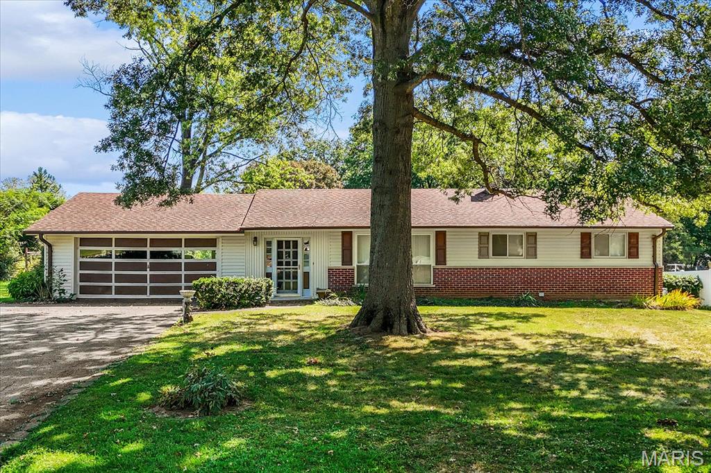 Looking for a home with great bones, a fantastic location, and room to add your personal touch? This well-maintained 4-bedroom, 2-bath ranch offers exceptional value and endless potential. Featuring a spacious 2-car garage, oversized driveway, and updated windows, this home has been lovingly cared for over the years and is ready for its next chapter. Step inside to find a clean, inviting floor plan with hardwood flooring under carpet in much of the home. The spacious layout provides flexibility for growing families, investors, or buyers looking to create their dream space. Major peace of mind comes with a professionally corrected basement completed by MHL, including a transferable warranty. Outside, enjoy a backyard designed for entertaining, relaxing, and making memories with family and friends. Whether you're hosting summer barbecues or creating your own outdoor oasis, the possibilities are endless. Conveniently located near schools, shopping, dining, parks, and major commuter routes, this home combines location, space, and value. Priced to sell and being offered in its current condition, this is a rare chance for savvy buyers, investors, or handyman enthusiasts to build equity in a desirable neighborhood. Don't miss this opportunity to make this ranch home your own and unlock its full potential!