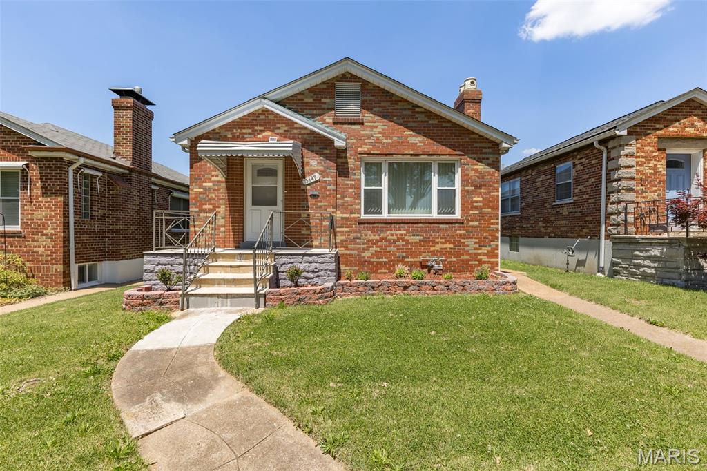 Full brick ranch-style home offering 2 bedrooms, 2 full baths, and a finished lower level with an additional guest/sleeping room, wet bar, dedicated laundry room, and plenty of storage. Fully updated kitchen with stainless steel appliances, solid surface countertops, fresh paint, updated HVAC and more! Enjoy the bonus room off the kitchen, charming level fenced backyard, and 1-car detached garage. Conveniently located in the desirable Hampton area of South St. Louis, near St. Louis Hills, with easy access to local parks, shopping, restaurants, coffee shops, and all the charm and amenities this vibrant neighborhood has to offer.