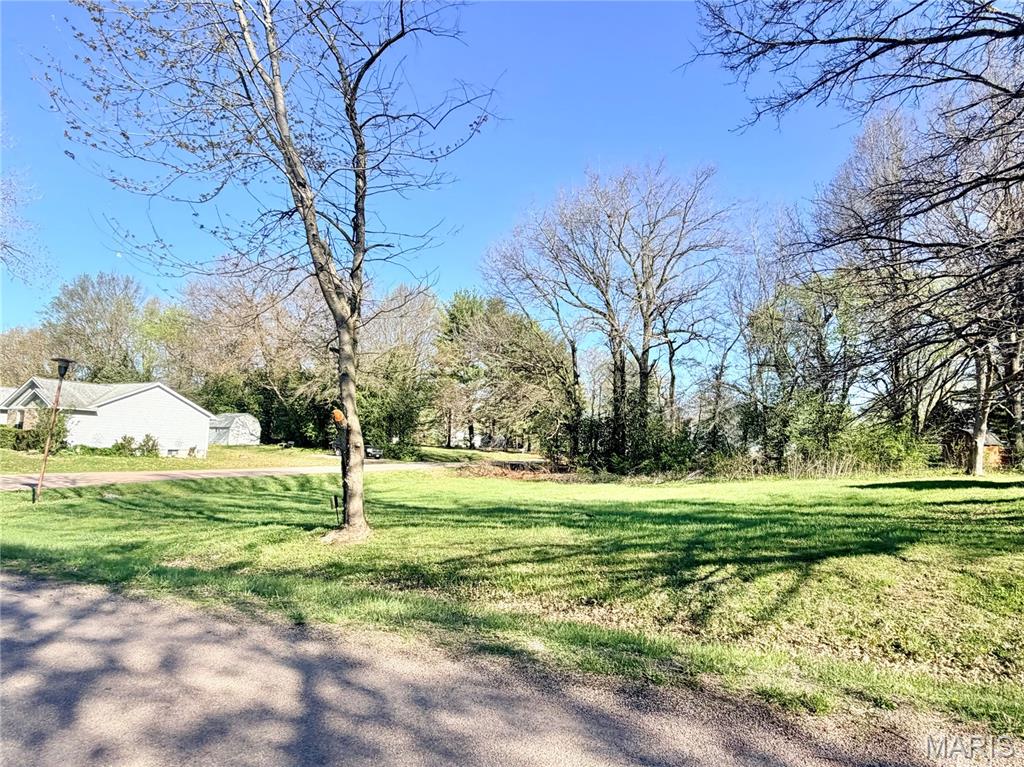 Just in time for summer! Don't miss this opportunity to own a .29 acre corner lot in the highly desirable Holiday Shores Lake community! This property offer the perfect lend of space, location, and potential. Whether you're ready to build now or invest for the future, enjoy all the benefits of lake living! Us the lot for lake access, recreation, and taking in everything Holiday Shores has to offer ~ boating, fishing, beaches, and a vibrant neighborhood atmosphere. Whether you're looking to build your forever home or secure a piece of this popular lake community, this lot is full of potential.