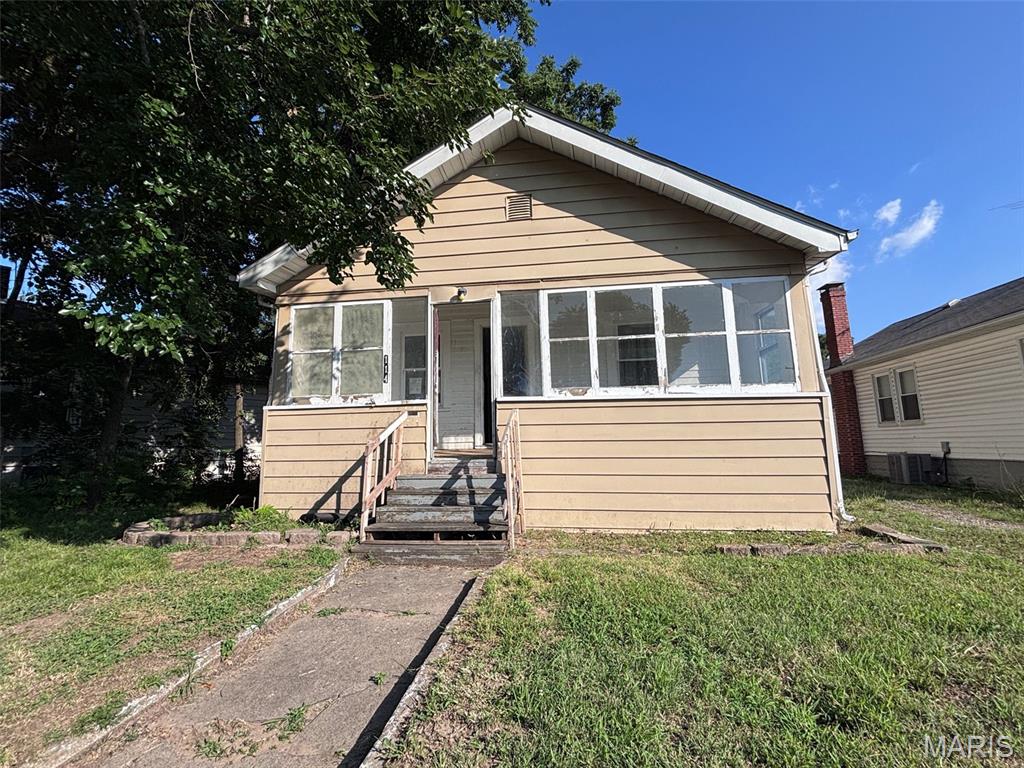 Who's looking for a project?? This 2 bedroom bungalow has tons of potential for the right handyman. It features 2 enclosed porches, a large living room, full basement and a huge yard perfect for entertaining. Make your appointment today and bring your vision to life. For more information please visit www.hudhomestore.gov   132-364792 UNINSURED. Owned by the US Department of HUD. Seller makes no representations or warranties as to the condition of property. Seller may contribute up to 3% of buyers closing costs upon buyers request. Sold AS-IS. Equal Housing Opportunity.