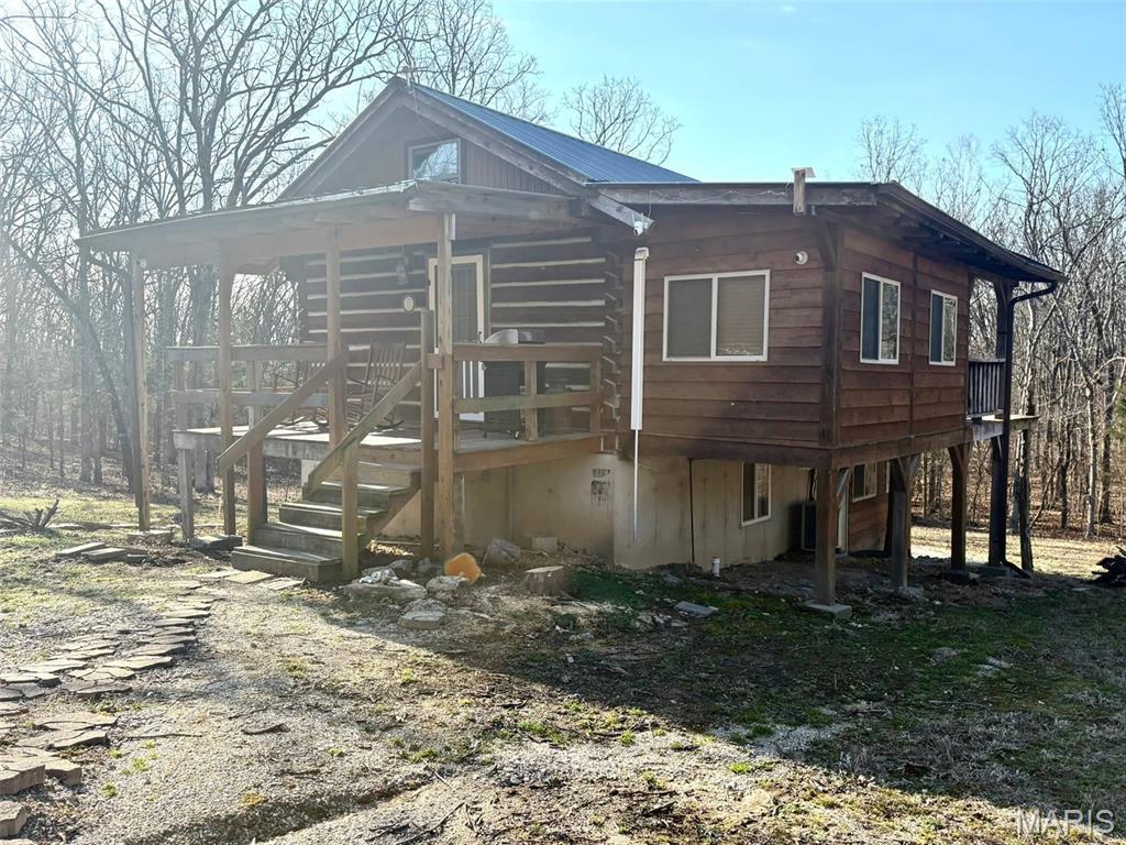 Whether you're dreaming of a seasonal hunting cabin, a short term rental investment, or just a quiet new place to call home; this cabin checks most of the boxes! 

This FULLY furnished 2 bed, 1 bath cabin in the Missouri Mountains is ready for a new owner. Outside you'll find a large 40x60ft Metal Garage, and a Large 3 vehicle "lean to" storage facility for side by sides, boats, or lawn mowers. This cozy rural Missouri property is conveniently placed on 10.37 gently wooded acres, with 2 wet weather creeks, 1 small hobby pond and fully fenced, and wildlife that greets you straight from the back porch - this cabin in the woods is meant to attract. 

Whether you're dreaming of a seasonal hunting cabin, a short term rental investment, or just a quiet new place to call home; this cabin checks most of the boxes! 

If you have been looking for a unique property with all of the peace and serenity of the outdoors, all while still 15 minutes from Fort Leonard Wood, I invite you to take a look at this one.