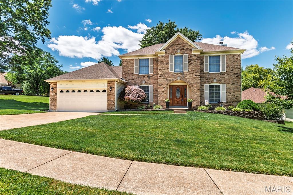 Welcome to this well maintained 3 bedroom, 2.5 bath two-story home in the highly sought-after Canterbury Farms subdivision and award-winning Lindbergh School District. Offering over 2,400 square feet of living space, this classic two-story home combines timeless charm with comfortable everyday living and impressive curb appeal. Step inside to find spacious living and dining areas.  The first floor and upper level have beautiful hardwood floors.  Warm and inviting family room with gas fireplace and bay window.  Updated kitchen with a vaulted ceiling, skylights, custom cabinetry, granite countertops, pull out shelves, 2 spice racks, 2 lazy Susan and a huge pantry with roll out shelving.  Main floor laundry.  The generous primary suite offers a private retreat with 2 walk in closets and an updated master bath with separate tub and shower, 2 sinks and make up area.  The additional bedrooms provide flexibility for guests or a home office space.  Finished lower level with family room and office/bonus room area.  It also has plenty of basement storage. Roof 2025.  Water Heater 1 year old.  Level back yard with a covered deck that is ideal for relaxing and entertaining.