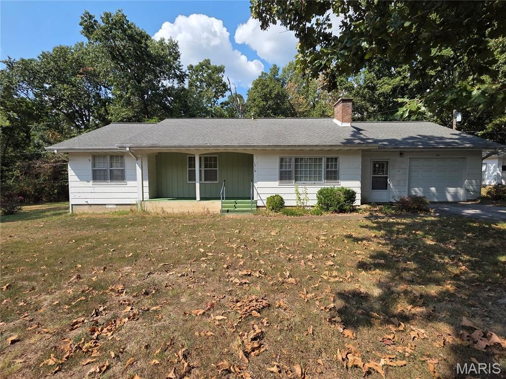 Check out this 3 bedroom, 1.5 bath charming 1963 ranch-style home! Offering classic character and plenty of potential! Featuring a comfortable floor plan and inviting living spaces with the opportunity to add your personal style and modern touch! Large spacious kitchen with ample storage and counter space. Some original hardwood flooring and a brick wood burning fireplace are just a few of this homes endearing features! Attached one car garage and paved driveway. A 16x22 shop building with electric, concrete floors, overhead door and cellar/storm shelter. Conveniently located on a 1.10 acre lot inside the city limits of Houston. Close to local amenities.
