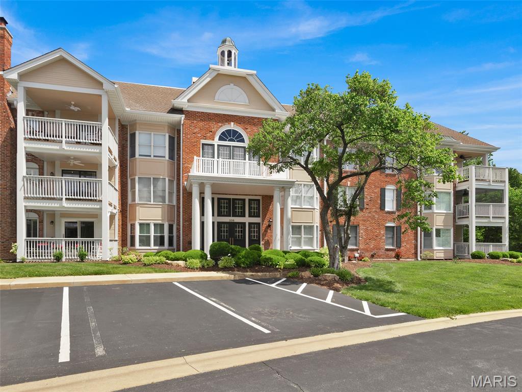 Are you looking for a lovely condo in a wonderful building, with secure, underground parking and an elevator? This condo, nestled in the serene, wooded landscape of Baywood Villages, has all that and more!  This sophisticated 3-bedroom, 2-bathroom condo offers the perfect blend of natural tranquility and urban convenience in this prime Chesterfield community. Step inside #206, through a roomy foyer, and see a large living room with gas burning fireplace, lots of windows, and a spacious dining room. Discover the bright, open floor plan, defined by beautiful millwork and an abundance of windows throughout, to appreciate the scenic, leafy views. The kitchen with breakfast room is nicely appointed, with granite countertops, stainless appliances, and a great bay window. Step out from the breakfast room to a fabulous screen porch, a favorite amenity of many!! Sit, sip, read a book, relax! The primary suite IS HUGE, providing a quiet retreat with TWO walk-in closets, while the second bedroom is ideal for guests or can be a dedicated home office. The third bedroom is currently set up as a den or office. Options!  The common areas of this building are tasteful, with warm, clean neutral colors throughout.  Note the welcoming lobby, the generous-sized common area just inside the lobby for gathering, and the grand staircase that wraps all the way to the third floor. A hidden gem at the top of the stairs from the lobby is a sweet little gathering spot for all, to play cards, put a puzzle together, etc. The elevator will get you there, too!  From the moment you arrive at 208 Ambridge Ct, #206, you will notice the ease of living provided by this secure, spotless building.   Enjoy community amenities, including an outdoor pool, clubhouse and peaceful walking trails. All this, AND just minutes from premier shopping, dining, highway access, and hospitals. See additional details under the photos.