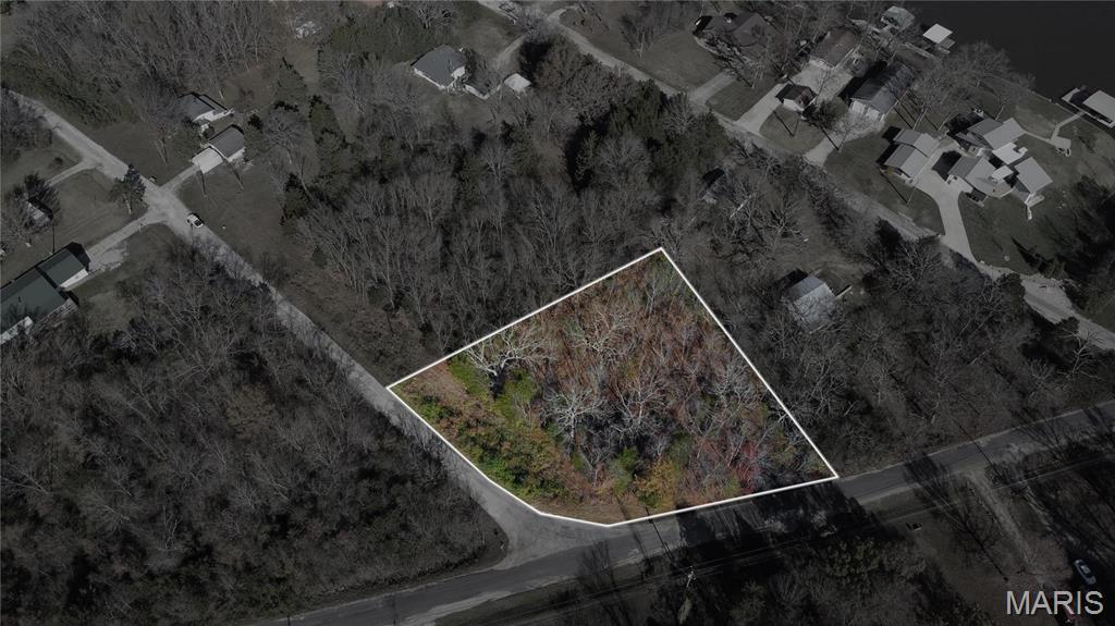 PRICE IMPROVEMENT! Ready to build in your very own gated lake community? Looking for a summer get-away spot? This double lot is perfect for both! Located in Indian Hills, this beautiful community sits on a 326+/- acre stocked lake, surrounded by several amenities including a community beach area, playground and tennis courts. Street maintenance and snow removal are included as well. This lot is surveyed and in its natural state, waiting for you to make it yours! For more information about Indian Hills Lake, visit ILPOA.org (HOA fees may vary). Schedule your own personal showing with Daniel, today!
