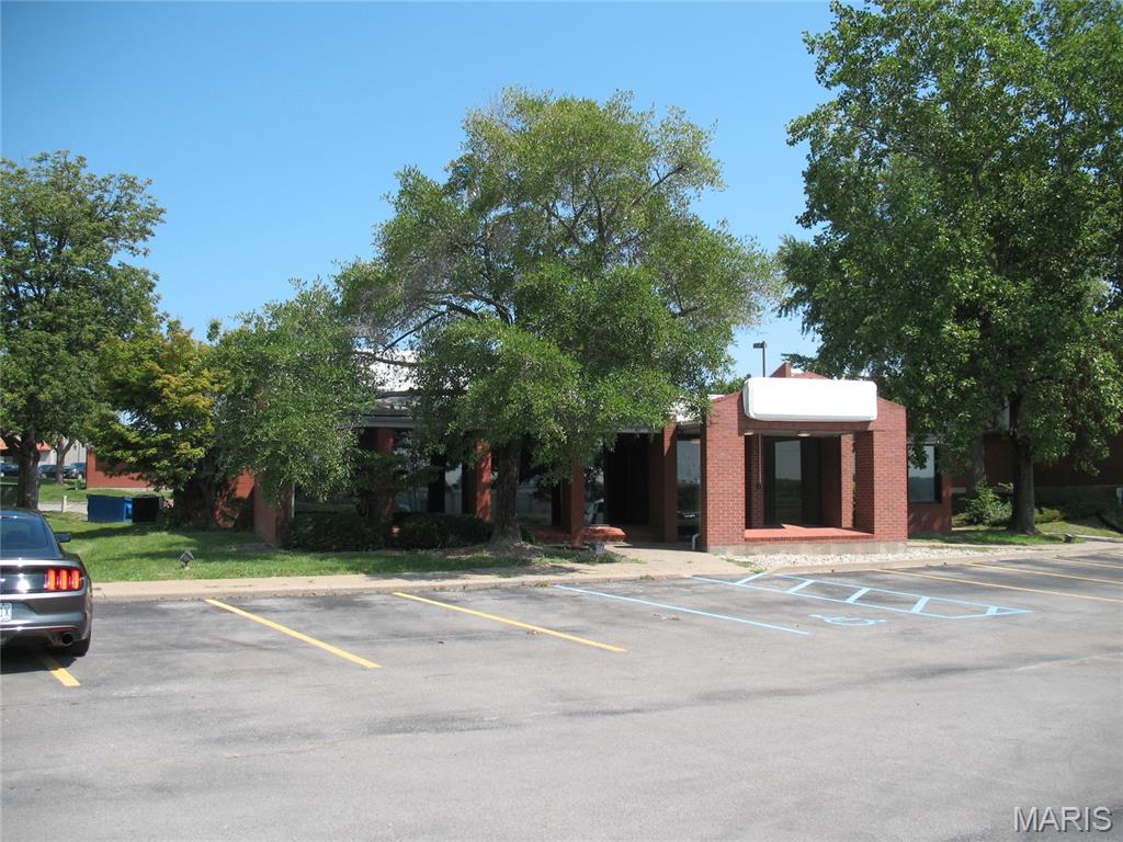 This 9,857 SF office building spans two levels, boasts a versatile layout featuring multiple offices, exam rooms, and restrooms to accommodate diverse professional needs. With the advantage of public and private entrances, the building offers a seamless flow for both clients and staff.