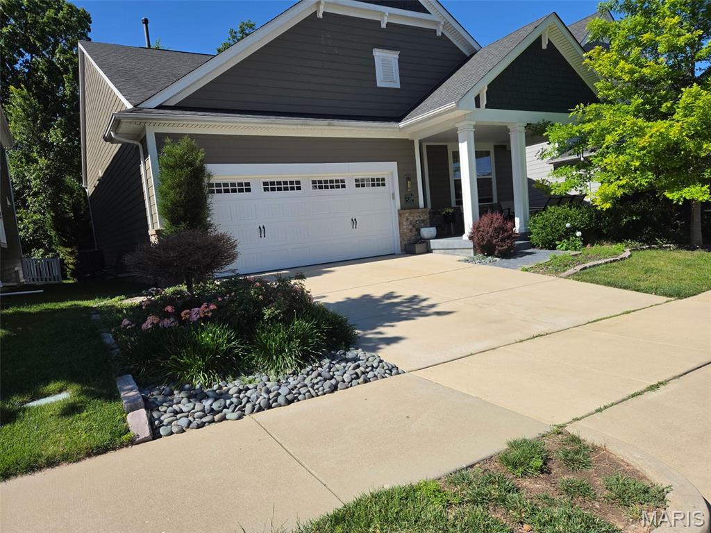 LOVELY, TURN-KEY, RANCH home, built in 2018, offers excellent space and modern living in one of the area’s most desirable, recently developed community, Main Street Crossing. 2 Bedroom, 2 full bath home featuring 1,631+/- SqFt, 9’+/- ceilings & laminate “wood like” flooring through-out (except bedrooms & office). Spacious, yet COZY, covered front porch greets you as you step inside the entry foyer. Living room boasts 12’+/- ceiling, gas fireplace w/Marble surround & recessed lighting. Fabulous kitchen offers custom cabinetry, center island w/breakfast bar, Frigidaire stainless steel appliances, Quartz countertops, tile backsplash, butler’s pantry & 12’+/- ceiling. Breakfast/dining area with 12’+/- ceiling & a sliding glass walk-out to deck allowing plenty of natural light. Primary suite with carpet, bay window & ensuite full bath with a large custom shower, double single sink vanity, private commode & large custom walk-in closet. Other bedroom with carpet, slide closet & shares hall bath with a shower/tub & single sink vanity. Laundry room & office complete the main level. Unfinished, lower-level has great potential for additional living space just awaiting your finishing touches w/8’+/- ceilings, roughed-in full bath & egress window. Outside, enjoy an AWESOME level lot with a wood deck, concrete patio & 2-car attached garage w/epoxy flooring. Within the Rockwood School District, easy access to Highway 100/Manchester Road & minutes to Wildwood Town Center, shopping, parks, dining & amenities. MUST SEE! More photos to come! :)