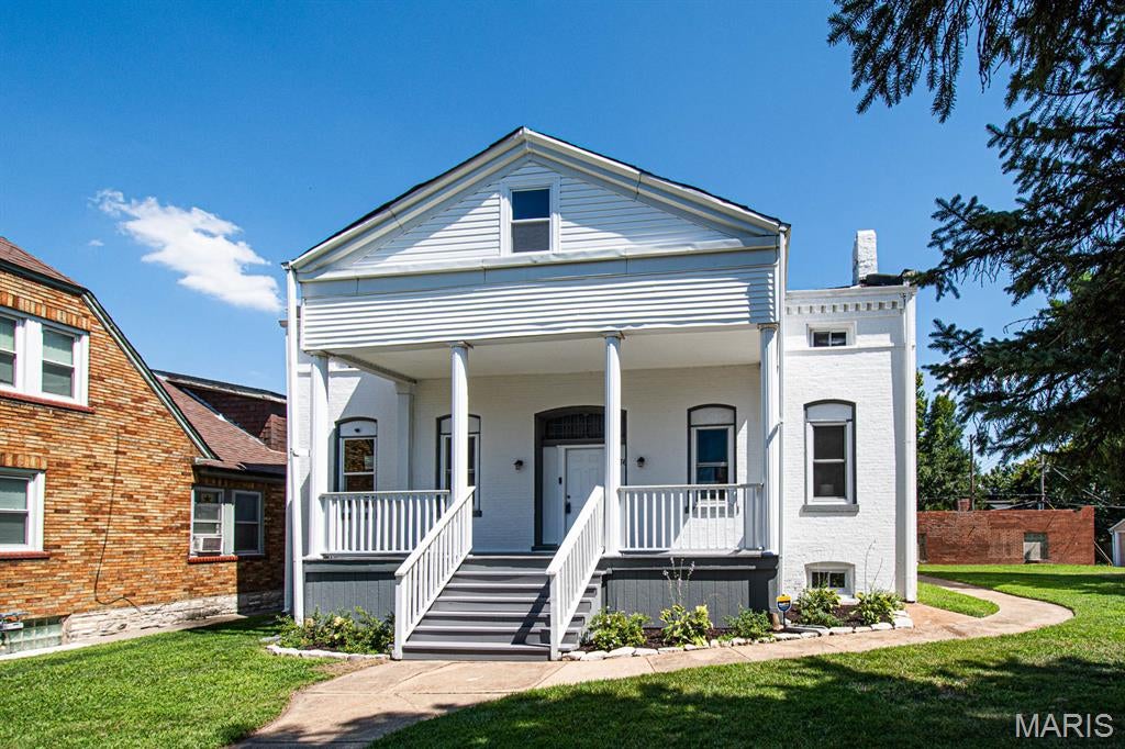 Completely rehabbed beautiful home on a double lot with 4-car oversized garage!!  Welcome to this HUGE 4 bedroom 2.5 bath south city home. Fall in love with sky high ceilings, tons of windows for natural light and loads of updates.  This home has been completely renovated. New HVAC, Electrical, Plumbing, Flooring, Etc.  Luxury vinyl flooring throughout.  Spacious living room. Brand New kitchen with custom countertops and cabinets, two sinks, extra large island, ton's of natural light and stainless steel appliances.  HUGE main floor primary suite with a massive walk-in closet. Main and floor laundry and a half-bath that is tucked out of the way for privacy.  Upstairs there are 3 very large bedrooms with tons of closet space and a fantastic bathroom featuring and addition laundry hook up.  Outside, you'll love the fenced in double lot with the aforementioned oversized garage.   This house is amazing.  Super convenient to  highways, shopping, night life and everything South City has to offer. Just two block from the Marquette Park Rec Center and Pool as well a short distance to Ted Drew's! Property is also located in the Washu/BJC "Live Near Where You Work" area. Qualified buyers can receive up to $12,000 in down payment and closing cost assistance.