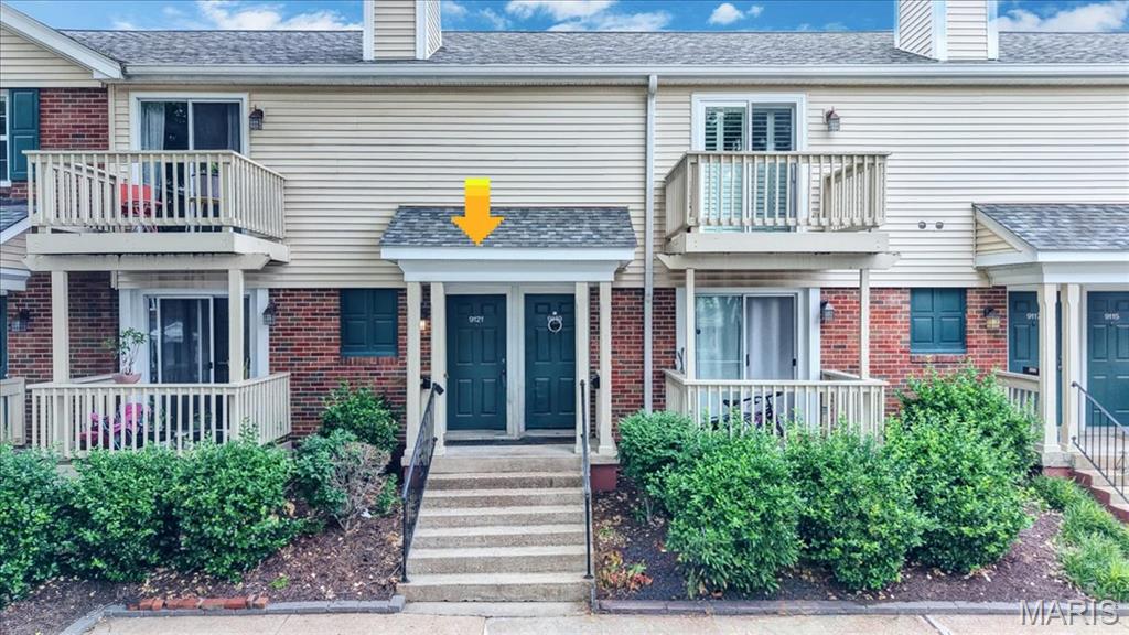 NEW PRICE: $159,900! Welcome to 9121 North Swan Circle! This move-in ready, large, open, 2nd-floor 2BD/1BA condo has vaulted ceilings, a wood-burning fireplace, and TWO balconies (front and back)! Plantation shutters on windows. Sliding door to back balcony with storage closet overlooks a park-like common area. Refrigerator, washer, and dryer included. Standard HOA is $402/mo and covers roof, snow, water, sewer, trash, pest control, lawn, pools, clubhouse, and tennis courts. Note: Temporary $540/mo special assessment runs through Dec 2026 to fund proactive building updates (foundation, sewer/drain rehabilitation, balcony safety, and replenished reserves)—meaning you get a structurally revitalized building right before costs drop. Walk to shopping/dining. Easy access to major highways. Minutes to Airport, WashU, SLU, Clayton, and Downtown St. Louis. Schedule your showing today!