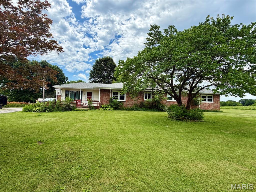 NOT A RENTAL - BEWARE OF SCAMS THIS HOME IS ONLY FOR SALE. Welcome to 290 Highway JJ, where peaceful country living meets incredible opportunity. Nestled in a serene setting, this charming home offers the perfect escape and invites you to add your own personal style and vision.

Ideal for first-time homebuyers, this property includes valuable extras to provide peace of mind, including a refrigerator, a washer, a dryer, and an Assurant Essential one-year home warranty.

Step inside through the inviting sunroom, which has newer Anderson windows, fill the space with natural light, and warm wood flooring creates a welcoming first impression. From there, you'll enter the spacious eat-in kitchen featuring tile flooring, abundant room for gathering, and a deep walk-in pantry for exceptional storage. The kitchen sink overlooks the picturesque front yard, allowing you to enjoy the scenic views while preparing meals.

Just beyond the kitchen, the generously sized living room offers the perfect setting for entertaining family and friends or simply relaxing at the end of the day.

Down the hall, you'll find two secondary bedrooms with beautiful wood floors connected by a convenient Jack-and-Jill bathroom, plus one more bathroom. The private primary suite features its own ensuite bath, creating a comfortable retreat. Main-floor laundry adds ease and convenience to everyday living.

Outside, you'll appreciate the attached two-car garage, along with a detached third garage or workshop—ideal for hobbies, storage, or additional workspace. Oh, wait, I almost forgot to mention the fruit-bearing apple, cherry, and pawpaw trees.

Spend your evenings unwinding on the back deck, surrounded by the tranquility of the countryside.

This home is expected to qualify for USDA, VA, and FHA financing, making homeownership more accessible than ever.

If you're ready to embrace the good life and create a home that's uniquely your own, 290 Highway JJ is ready to welcome you home.