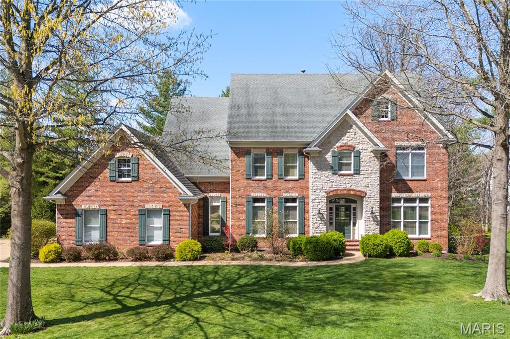Located on a quiet street with mature trees and landscaped grounds, this home combines thoughtful updates with classic architectural details in one of Chesterfield's most established neighborhoods. This 4-bedroom, 4 full and 2 half bath home offers over 6,100 square feet of well-designed living space. The main level features hardwood floors, clean lines, and a balanced mix of formal and casual spaces, perfect for both everyday living and entertaining. The kitchen is equipped with high-end appliances, custom cabinetry, and a large center island with seating—seamlessly connected to a casual dining area and light-filled family room. A formal dining room and home office provide additional flexibility. Upstairs, the spacious primary suite includes a private sitting area and a well-appointed bath. Each secondary bedroom has its own en suite bath. A finished lower level adds even more functionality with space for a media room, fitness area, or playroom. Additional Rooms: Mud Room
