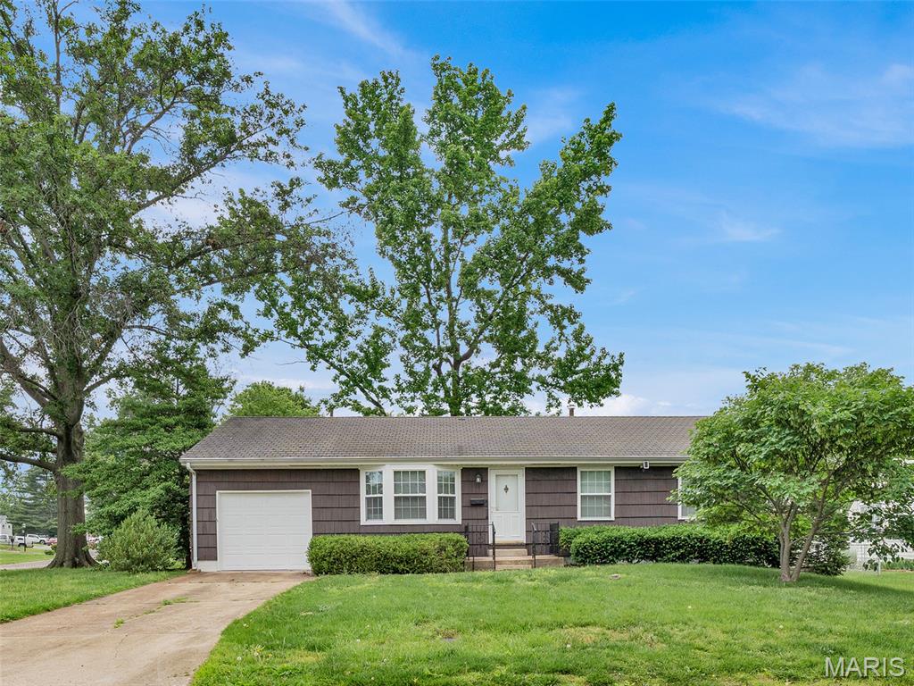 Investor special in one of Affton’s most desirable neighborhoods! This 3 bedroom, 1.5 bathroom home is packed with potential and ready for the next owner’s vision. Situated on a spacious corner lot, the property features an attached 1 car garage, fenced backyard, screened in porch, and a den addition that provides extra living space and flexibility. Original hardwood floors are already in great shape and provide the perfect foundation for a stunning renovation. Whether you’re looking for your next flip, renovation project, or an opportunity to build equity in a sought after area, this home offers incredible upside. Great layout with endless possibilities to transform this property into something truly special. Property to be sold as-is.