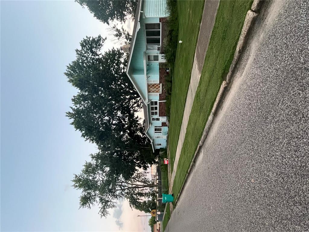 NEW LISTING.......  This home sits on .40 acres directly in front of the Cuba Schools football field in a quiet, Mayberry-style neighborhood on the corner of Wild Cat Drive & S Bond Street. This property needs a little TLC.  Offering income paths and strong long-term potential.  Fix-n-Flip, Hold it, Rent it or Live in it!!!  
MAIN HOME FEATURES:
3 bedrooms, 1 bath.
2023 refinished hardwood floors in living room, hallway, and bedrooms.
Dining room + kitchen.
Floor-to-ceiling stone wood-burning fireplace.
Bonus room ideal for a 4th bedroom, office, or den.

INCOME BOOSTING BONUS:
Attached but fully separate 1-bedroom apartment.
Private front entrance.
Private back door entrance.
Bathroom & closet.
Renovations already started.
No interior access to the main home, making it ideal for rental income, Airbnb, or an in-law suite.
LARGE OUTBUILDING
Located in the backyard with loft, perfect for conversion into a tiny home, she-shed, or man cave.

Exterior features:
Double concrete off-street parking,
Side porch + small porch.
Large back deck,
Full chain-link fenced yard around almost the entire property,
New roof in 2020.

This property offers multiple income streams, flexible living arrangements, and strong upside for investors or owner-occupants.  Don't miss this one, give me a call to schedule your tour.  CASH OR CONVENTIONAL, AS IS.