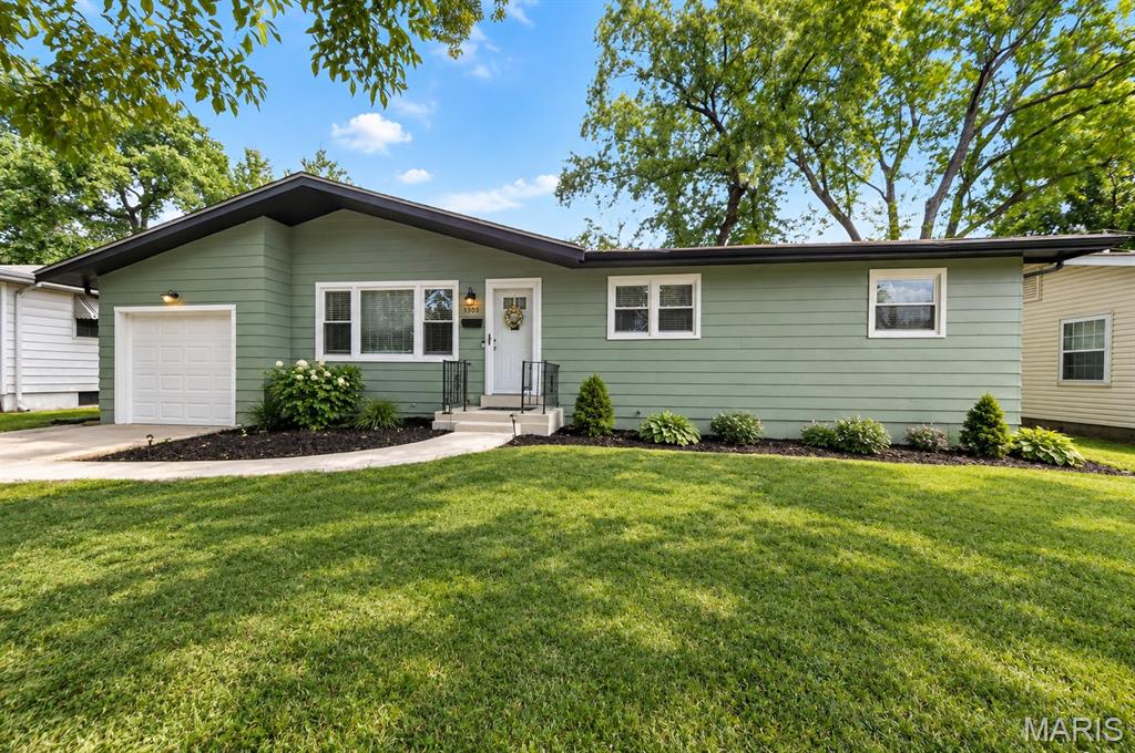 Welcome home! Nestled in the heart of Florissant and located in the Hazelwood School District, this charming ranch is packed with updates and ready for its next chapter. Offering 3 bedrooms, 1.5 baths, a 1-car garage, full basement, and an impressively spacious backyard, there’s plenty of room to settle in and make it your own.

Step inside to gleaming hardwood floors and a bright, refreshed interior. The updated kitchen features newer cabinets, countertops, appliances, flooring, light fixtures, and a beautiful backsplash that pulls it all together. Both bathrooms have also been recently updated, so you can happily leave those renovation projects to someone else!

And the updates don’t stop at the pretty stuff. Enjoy ALL NEW windows, a newer furnace and water heater, newer plumbing and plumbing stack, and an updated electrical panel. The entire exterior has been freshly painted and paired with fresh landscaping for a crisp, welcoming first impression.

Downstairs, the open partially finished basement features painted ceilings, walls and floors, plus an additional sleeping room or game room just waiting for your finishing touches. Movie room? Home gym? Kids’ hangout? Your questionable collection of holiday decorations? There’s room for it. 

Out back, the large yard offers tons of space for entertaining, pets, play, gardening, or simply enjoying your own little slice of outdoors.

Updated, inviting, and full of possibilities, this one just feels like home. Come see it for yourself!