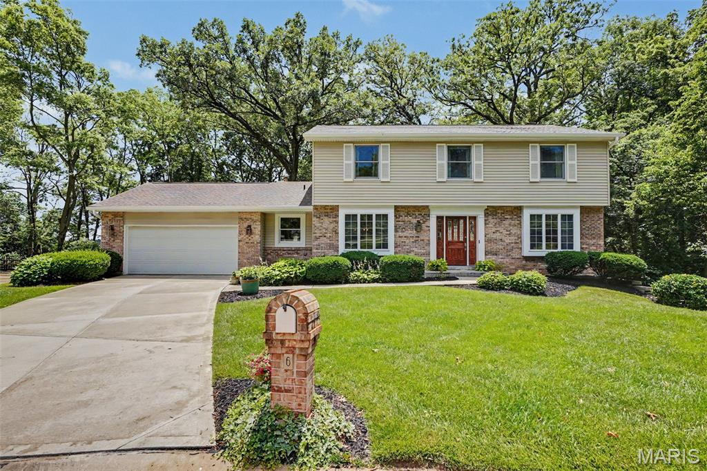 Here is your chance to own in the highly desired Timberwood Trails subdivision near Cottleville! This charming home is full of possibilities and waiting for the personal touches of a new owner. Tucked away in a cul-de-sac, this 2400 sq ft two story with 4 bedrooms and 2.5 bathrooms is bursting with potential. Offering both an eat in kitchen and separate dining room, it’s primed for entertaining. Also on the main level is a laundry room right off the kitchen, a living room and separate family room that boasts a wood burning fireplace. Upstairs features the primary bedroom with attached primary bath, three additional spacious bedrooms and a full bathroom.  The unfinished walkout basement provides room to dream, whether you envision future living space, a playroom, home gym, workshop or extra storage. And if all of this wasn’t enough, your very own lush hideaway is waiting in the backyard. Backing to farmland, you can expect a beautiful backdrop for quiet mornings, weekend gatherings, or simply relaxing at the end of the day. All of this is within your reach while being only minutes away from key Cottleville attractions! If this is the chance you’ve been waiting for, hop to it before this chance is gone! 
Nearby attractions: 
Subdivision Pool .6 mi
Mannino’s Market .9 mi
Frankie Martin’s Garden 1.1 mi
Legacy Park 1.3 mi
Noto Italian Restaurant 1.7 mi