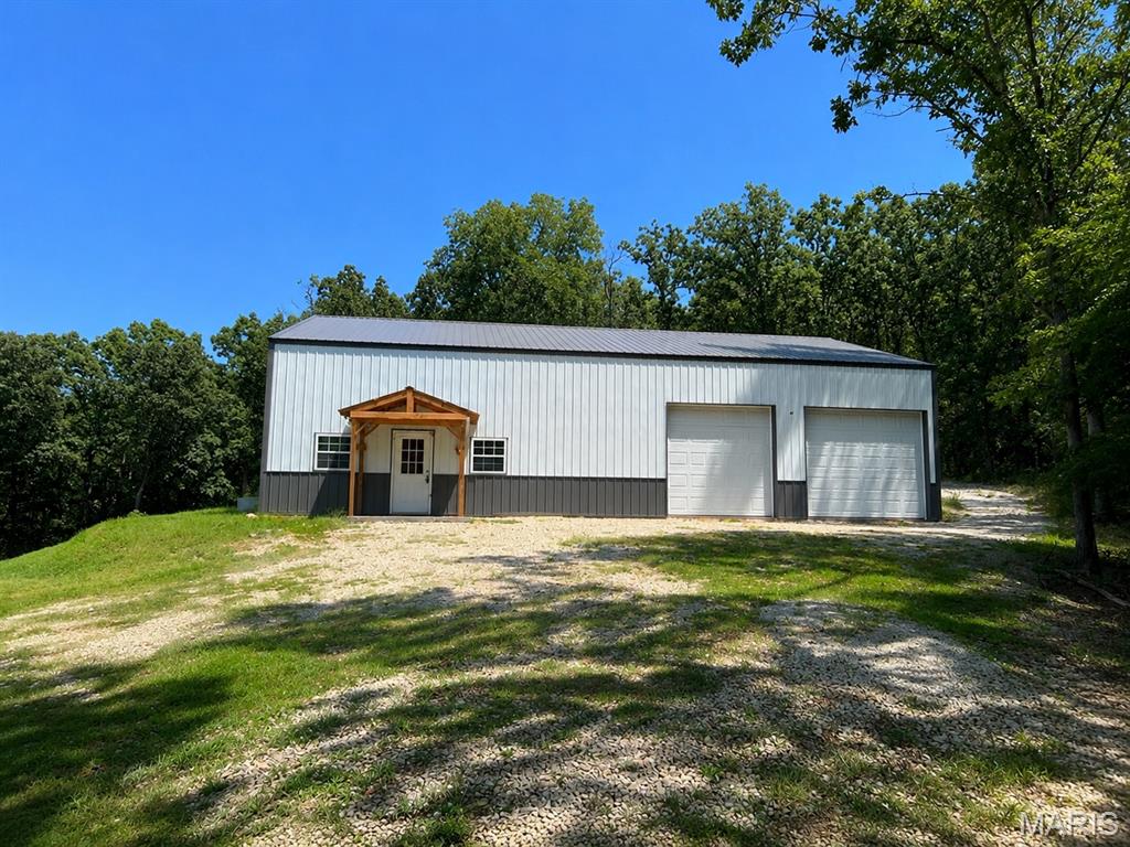 Welcome to your own private retreat! Whether you're looking for a peaceful place to call home, a hunting and recreational property, or a getaway where you can bring your vision to life, this property offers plenty of potential.
Situated on over 5 acres, this 3-bedroom, 1-bath home features an open-concept main floor with a spacious kitchen, living room, and dining area, along with a main-floor bedroom, full bathroom, laundry room, and convenient access to the oversized attached garage. Upstairs, you'll find two additional bedrooms, providing plenty of space for family, guests, or a home office.
Outside, enjoy an established yard surrounded by woods and natural beauty. The property offers two entrances, an additional detached garage with a concrete floor, and plenty of room for animals, outdoor equipment, hunting, recreation, or off-road toys.
Bring your ideas and make this property your own—whether you're dreaming of a country home, weekend retreat, hunting camp, or recreational getaway, the possibilities are here!