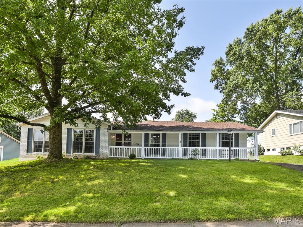 A rare opportunity to find an affordable ranch home in Parkway Schools w/over 2500sqft of living space, 3+bedrooms & 3 FULL baths. As you enter, you’re greeted w/a formal living rm (could be converted to a home office or add’l bedroom), & formal dining room. Next, step into the spacious great room that offers a vaulted ceiling, new ceiling fan/light fixture, W/B fireplace, & sliding glass doors leading to a private patio. The eat in kitchen w/desirable white cabinets, granite counters, black & SS appliances, vaulted ceiling, & double pantry has been updated during sellers' ownership. You’ll appreciate the easy-care wood floors thru out the main level.  LL is add’l wow factor w/LVP flooring, a large family room/man cave, HUGE sleeping room, a full bath w/walk in shower & a ginormous unfin laundry/storage area. Covered front porch, rear entry 2 car garage, thermal windows, ceiling fans, crown molding in most rooms, some new light fixtures, & ROOF ONLY 5 yrs old.  Home warranty plan included. Curtains not included in sale. Frig., washer & dryer stay